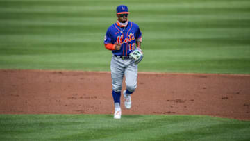 JUPITER, FLORIDA - MARCH 01: Francisco Lindor #12 of the New York Mets runs back to the duggout in the second inning against the Miami Marlins in a spring training game at Roger Dean Chevrolet Stadium on March 01, 2021 in Jupiter, Florida. (Photo by Mark Brown/Getty Images)