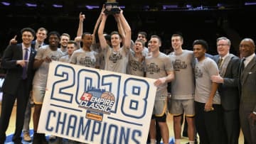 NEW YORK, NEW YORK - NOVEMBER 16: The Iowa Hawkeyes celebrate the win of the championship game against the Connecticut Huskies during the 2K Empire Classic at Madison Square Garden on November 16, 2018 in New York City. (Photo by Sarah Stier/Getty Images)