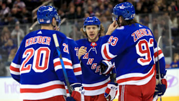Nov 21, 2021; New York, New York, USA; New York Rangers left wing Artemi Panarin (10) talks with left wing Chris Kreider (20) and center Mika Zibanejad (93) during the first period against the Buffalo Sabres at Madison Square Garden. Mandatory Credit: Danny Wild-USA TODAY Sports