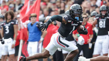 Cincinnati Bearcats wide receiver Tre Tucker runs the ball during game against the Kennesaw State Owls at Nippert Stadium. Getty Images.