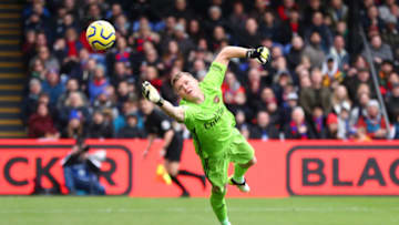 LONDON, ENGLAND - JANUARY 11: Bernd Leno of Arsenal dives for the ball as Jordan Ayew of Crystal Palace (out of frame) scores his team's first goal during the Premier League match between Crystal Palace and Arsenal FC at Selhurst Park on January 11, 2020 in London, United Kingdom. (Photo by Dan Istitene/Getty Images)