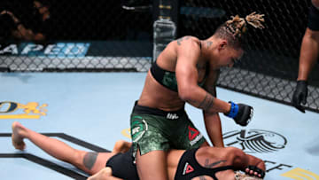 LAS VEGAS, NEVADA - AUGUST 22: Shana Dobson punches Mariya Agapova of Kazakhstan in their flyweight fight during the UFC Fight Night event at UFC APEX on August 22, 2020 in Las Vegas, Nevada. (Photo by Chris Unger/Zuffa LLC)