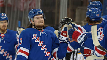 New York Rangers left wing Alexis Lafreniere (13) celebrates after scoring a goal against the Buffalo Sabres Credit: Bruce Bennett-POOL PHOTOS-USA TODAY Sports