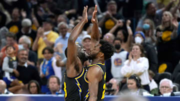 SAN FRANCISCO, CALIFORNIA - MAY 07: Draymond Green #23 and Andrew Wiggins #22 of the Golden State Warriors celebrates after Wiggins scored and was fouled on the shot against the Memphis Grizzlies during the first half of Game Three of the Western Conference Semifinals of the NBA Playoffs at Chase Center on May 07, 2022 in San Francisco, California. NOTE TO USER: User expressly acknowledges and agrees that, by downloading and or using this photograph, User is consenting to the terms and conditions of the Getty Images License Agreement. (Photo by Thearon W. Henderson/Getty Images)