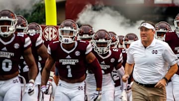STARKVILLE, MS - OCTOBER 21: Head coach Dan Mullen of the Mississippi State Bulldogs takes the field with his team before the start of an NCAA football game against the Kentucky Wildcats at Davis Wade Stadium on October 21, 2017 in Starkville, Mississippi. (Photo by Butch Dill/Getty Images)