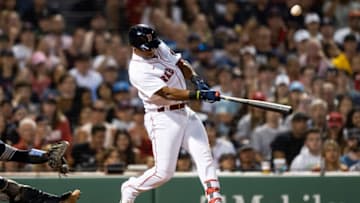 BOSTON, MA - JULY 10: Jeter Downs #20 of the Boston Red Sox hits an RBI single during the sixth inning of a game against the New York Yankees on July 10, 2022 at Fenway Park in Boston, Massachusetts. (Photo by Billie Weiss/Boston Red Sox/Getty Images)