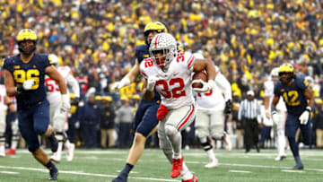 ANN ARBOR, MICHIGAN - NOVEMBER 27: TreVeyon Henderson #32 of the Ohio State Buckeyes carries the ball down the field in the second half of the game against the Michigan Wolverines at Michigan Stadium on November 27, 2021 in Ann Arbor, Michigan. (Photo by Mike Mulholland/Getty Images)