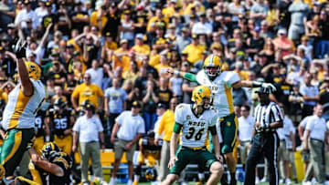 Sep 17, 2016; Iowa City, IA, USA; North Dakota State Bison place kicker Cam Pedersen (36) celebrates with placeholder Cole Davis (7) after kicking the game winning field goal on the final play of the fourth quarter against the Iowa Hawkeyes at Kinnick Stadium. North Dakota State won 23-21. Mandatory Credit: Jeffrey Becker-USA TODAY Sports