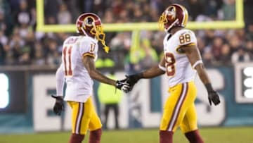 Dec 26, 2015; Philadelphia, PA, USA; Washington Redskins wide receiver DeSean Jackson (11) and wide receiver Pierre Garcon (88) react after a first down against the Philadelphia Eagles during the second half at Lincoln Financial Field. The Redskins won 38-24. Mandatory Credit: Bill Streicher-USA TODAY Sports