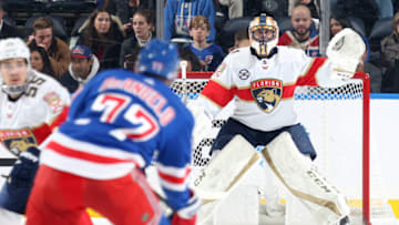 NEW YORK, NY - NOVEMBER 17: Roberto Luongo #1 of the Florida Panthers looks on against Tony DeAngelo #77 of the New York Rangers at Madison Square Garden on November 17, 2018 in New York City. The New York Rangers won 4-2. (Photo by Jared Silber/NHLI via Getty Images)