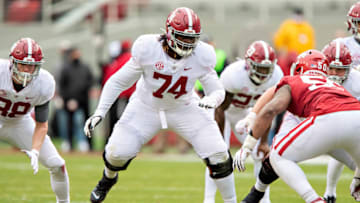 FAYETTEVILLE, AR - DECEMBER 12: Damieon George #74 of the Alabama Crimson Tide blocks during a game against the Arkansas Razorbacks at Razorback Stadium on December 12, 2020 in Fayetteville, Arkansas. The Crimson Tide defeated the Razorbacks 52-3. (Photo by Wesley Hitt/Getty Images)