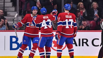 MONTREAL, QC - APRIL 06: Montreal Canadiens Jordan Weal and Brett Kulak (Photo by Minas Panagiotakis/Getty Images)