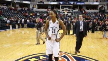 Oct 11, 2015; Indianapolis, IN, USA; Indiana Fever forward Tamika Catchings (24) smiles as she walks off the floor after the game against the Minnesota Lynx during game four of the WNBA Finals at Bankers Life Fieldhouse. Indiana defeats Minnesota 75-69. Mandatory Credit: Brian Spurlock-USA TODAY Sports