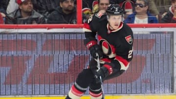 Feb 10, 2016; Ottawa, Ontario, CAN; Ottawa Senators defenseman Dion Phaneuf (2) skates with the puck in the first period against the Colorado Avalanche at the Canadian Tire Centre. Mandatory Credit: Marc DesRosiers-USA TODAY Sports