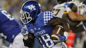 Sep 3, 2016; Lexington, KY, USA; Kentucky Wildcats running back Stanley Boom Williams (18) runs the ball against the Southern Mississippi Golden Eagles in the first half at Commonwealth Stadium. Mandatory Credit: Mark Zerof-USA TODAY Sports