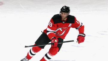 NEWARK, NEW JERSEY - JANUARY 24: Travis Zajac #19 of the New Jersey Devils skates against the New York Islanders at the Prudential Center on January 24, 2021 in Newark, New Jersey. (Photo by Bruce Bennett/Getty Images)