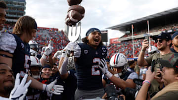 TUCSON, ARIZONA - NOVEMBER 18: Cornerback Treydan Stukes #2 of the Arizona Wildcats celebrates on the sideline after an interception during the second half against the Utah Utes at Arizona Stadium on November 18, 2023 in Tucson, Arizona. (Photo by Chris Coduto/Getty Images)