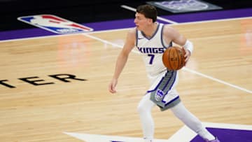 SACRAMENTO, CA - MAY 09: Kyle Guy #7 of the Sacramento Kings walks the ball in against the Oklahoma City Thunder during the game at Golden 1 Center on May 9, 2021 in Sacramento, California. NOTE TO USER: User expressly acknowledges and agrees that, by downloading and or using this photograph, User is consenting to the terms and conditions of the Getty Images License Agreement. (Photo by Ben Green/Getty Images)