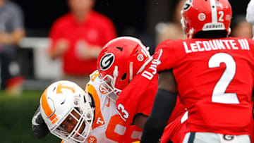 ATHENS, GEORGIA - OCTOBER 10: Ty Chandler #8 of the Tennessee Volunteers dives for a first down against Azeez Ojulari #13 of the Georgia Bulldogs during the first half at Sanford Stadium on October 10, 2020 in Athens, Georgia. (Photo by Kevin C. Cox/Getty Images)
