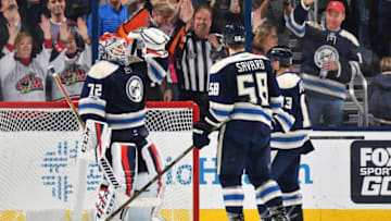 COLUMBUS, OH - MARCH 28: David Savard #58 and Cam Atkinson #13 of the Columbus Blue Jackets celebrate with goaltender Sergei Bobrovsky #72 of the Columbus Blue Jackets after defeating the Buffalo Sabres 3-1 on March 28, 2017 at Nationwide Arena in Columbus, Ohio. (Photo by Jamie Sabau/NHLI via Getty Images)