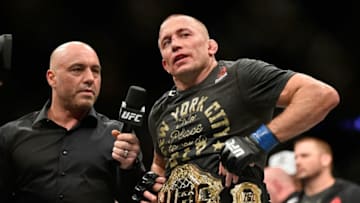 NEW YORK, NY - NOVEMBER 04: Georges St-Pierre of Canada accepts his championship belt after defeating Michael Bisping of England in their UFC middleweight championship bout during the UFC 217 event at Madison Square Garden on November 4, 2017 in New York City. (Photo by Jeff Bottari/Zuffa LLC/Zuffa LLC via Getty Images)