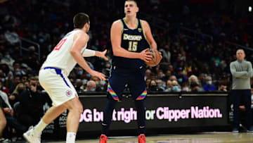 Denver Nuggets center Nikola Jokic (15) controls the ball against Los Angeles Clippers center Ivica Zubac (40) during the second half at Crypto.com Arena on 26 Dec. 2021. (Gary A. Vasquez-USA TODAY Sports)