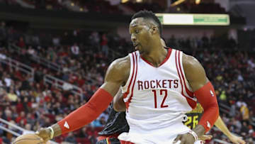 Dec 29, 2015; Houston, TX, USA; Houston Rockets center Dwight Howard (12) makes a spin move to the basket during the second half against the Atlanta Hawks at Toyota Center. The Hawks defeated the Rockets 121-115. Mandatory Credit: Troy Taormina-USA TODAY Sports