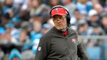 CHARLOTTE, NC - DECEMBER 24: Head coach Dirk Koetter of the Tampa Bay Buccaneers reacts between plays against the Carolina Panthers during their game at Bank of America Stadium on December 24, 2017 in Charlotte, North Carolina. (Photo by Grant Halverson/Getty Images)