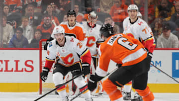 PHILADELPHIA, PENNSYLVANIA - NOVEMBER 23: Elias Lindholm #28 of the Calgary Flames skates against the Philadelphia Flyers at the Wells Fargo Center on November 23, 2019 in Philadelphia, Pennsylvania. (Photo by Bruce Bennett/Getty Images)