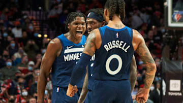 Minnesota Timberwolves forward Anthony Edwards, guard Patrick Beverley, and guard D'Angelo Russell celebrate. Mandatory Credit: Troy Wayrynen-USA TODAY Sports