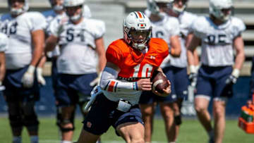 Auburn football quarterback Bo Nix (10) runs the ball during an open football practice at Jordan-Hare Stadium in Auburn, Ala., on Saturday, March 20, 2021.