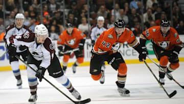 October 16, 2015; Anaheim, CA, USA; Colorado Avalanche right wing Mikko Rantanen (96) moves the puck ahead of Anaheim Ducks defenseman Josh Manson (42) and left wing Jiri Sekac (46) during the third period at Honda Center. Mandatory Credit: Gary A. Vasquez-USA TODAY Sports