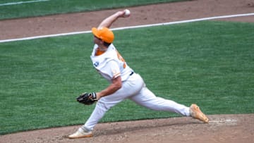 Jun 20, 2021; Omaha, Nebraska, USA; Tennessee Volunteers starting pitcher Chad Dallas (36) pitches against the Virginia Cavaliers at TD Ameritrade Park. Mandatory Credit: Steven Branscombe-USA TODAY Sports