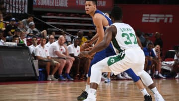 LAS VEGAS, NV - JULY 12: Kevin Knox #20 of the New York Knicks handles the ball against the Boston Celtics during the 2018 Las Vegas Summer League on July 12, 2018 at the Thomas & Mack Center in Las Vegas, Nevada. NOTE TO USER: User expressly acknowledges and agrees that, by downloading and/or using this Photograph, user is consenting to the terms and conditions of the Getty Images License Agreement. Mandatory Copyright Notice: Copyright 2018 NBAE (Photo by Garrett Ellwood/NBAE via Getty Images)