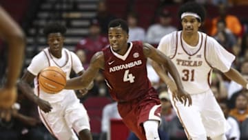 Dec 17, 2016; Houston, TX, USA; Arkansas Razorbacks guard Daryl Macon (4) dribbles the ball during the second half against the Texas Longhorns at Toyota Center. Mandatory Credit: Troy Taormina-USA TODAY Sports