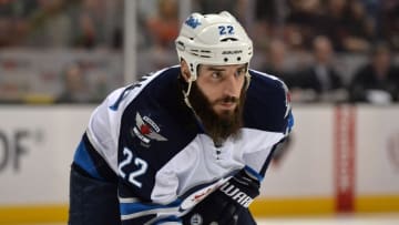 Apr 5, 2016; Anaheim, CA, USA; Winnipeg Jets right wing Chris Thorburn (22) reacts against the Anaheim Ducks during an NHL game at Honda Center. Mandatory Credit: Kirby Lee-USA TODAY Sports