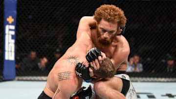 TAMPA, FLORIDA - OCTOBER 12: (R-L) Luis Pena of Italy knees Matt Frevola in their lightweight bout during the UFC Fight Night event at Amalie Arena on October 12, 2019 in Tampa, Florida. (Photo by Josh Hedges/Zuffa LLC via Getty Images)