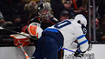 Oct 13, 2021; Anaheim, California, USA; Anaheim Ducks goaltender John Gibson (36) is involved in an altercation with Winnipeg Jets center Pierre-Luc Dubois (80) during the second period at Honda Center. Mandatory Credit: Gary A. Vasquez-USA TODAY Sports