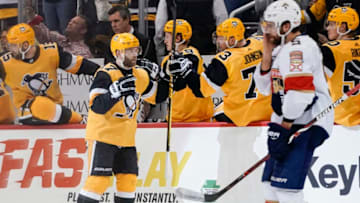 PITTSBURGH, PA - JANUARY 08: Pittsburgh Penguins Right Wing Bryan Rust (17) celebrates his goal with the bench during the second period in the NHL game between the Pittsburgh Penguins and the Florida Panthers on January 8, 2019, at PPG Paints Arena in Pittsburgh, PA. (Photo by Jeanine Leech/Icon Sportswire via Getty Images)