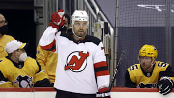Apr 22, 2021; Pittsburgh, Pennsylvania, USA; New Jersey Devils defenseman Matt Tennyson (7) reacts after scoring a goal against the Pittsburgh Penguins during the first period at PPG Paints Arena. Mandatory Credit: Charles LeClaire-USA TODAY Sports