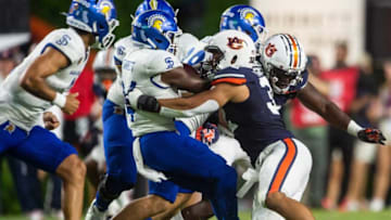 Auburn football linebacker Wesley Steiner (32) stops San Jose State Spartans running back Shamar Garrett (24) in the backfield as Auburn Tigers take on San Jose State Spartans at Jordan-Hare Stadium in Auburn, Ala., on Saturday, Sept. 10, 2022. San Jose State Spartans lead Auburn Tigers 10-7 at halftime.