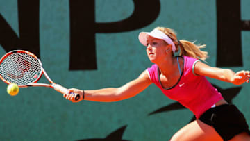 PARIS - MAY 31: Lauren Embree of USA hits a forehand during her Girl's Singles First Round match against Nastja Kolar of Slovakia on day eight of the French Open at Roland Garros on May 31, 2009 in Paris, France. (Photo by Matthew Stockman/Getty Images)