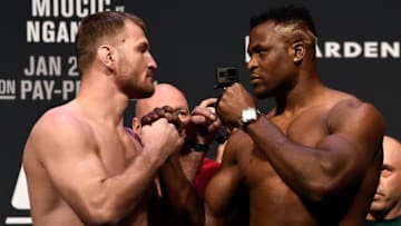 BOSTON, MA - JANUARY 19: (L-R) Stipe Miocic and Francis Ngannou of Cameroon face off during the UFC 220 weigh-in at TD Garden on January 19, 2018 in Boston, Massachusetts. (Photo by Jeff Bottari/Zuffa LLC/Zuffa LLC via Getty Images)