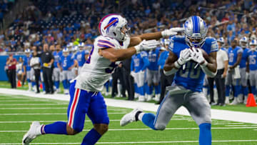 DETROIT, MI - AUGUST 23: Ty Johnson #38 of the Detroit Lions fights off a tackle from Matt Milano #58 of the Buffalo Bills and scores a first half touchdown during an NFL Pre-season game at Ford Field on August 23, 2019 in Detroit, Michigan. (Photo by Dave Reginek/Getty Images)