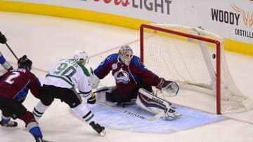 Feb 4, 2016; Denver, CO, USA; Dallas Stars center Jason Spezza (90) scores a goal on Colorado Avalanche goalie Calvin Pickard (31) in the first half at the Pepsi Center. Mandatory Credit: Ron Chenoy-USA TODAY Sports