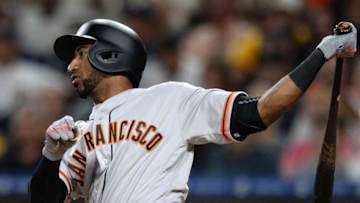 Sep 24, 2016; San Diego, CA, USA; San Francisco Giants third baseman Eduardo Nunez (10) hits an BRI single during the fourth inning against the San Diego Padres at Petco Park. Mandatory Credit: Jake Roth-USA TODAY Sports