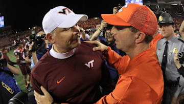 ORLANDO, FL - DECEMBER 03: Head coach Dabo Swinney of the Clemson Tigers and head coach Justin Fuente of the Virginia Tech Hokies shake hands during the ACC Championship on December 3, 2016 in Orlando, Florida. (Photo by Mike Ehrmann/Getty Images)