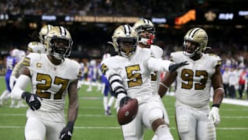 Nov 25, 2021; New Orleans, Louisiana, USA; New Orleans Saints middle linebacker Kwon Alexander (5) celebrates his interception in the second quarter against the Buffalo Bills at the Caesars Superdome. Mandatory Credit: Chuck Cook-USA TODAY Sports