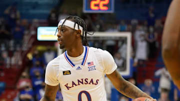 Dec 22, 2020; Lawrence, Kansas, USA; Kansas Jayhawks guard Marcus Garrett (0) dribbles the ball during the game against the West Virginia Mountaineers at Allen Fieldhouse. Mandatory Credit: Denny Medley-USA TODAY Sports