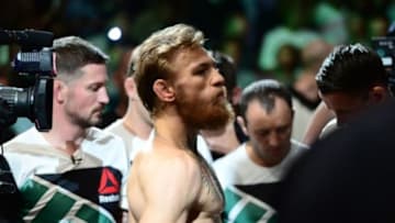 Jul 11, 2015; Las Vegas, NV, USA; Conor McGregor enters the arena to fight Chad Mendes (not pictured) for the interim featherweight title bout during UFC 189 at MGM Grand Garden Arena. McGregor won via second round TKO. Mandatory Credit: Joe Camporeale-USA TODAY Sports